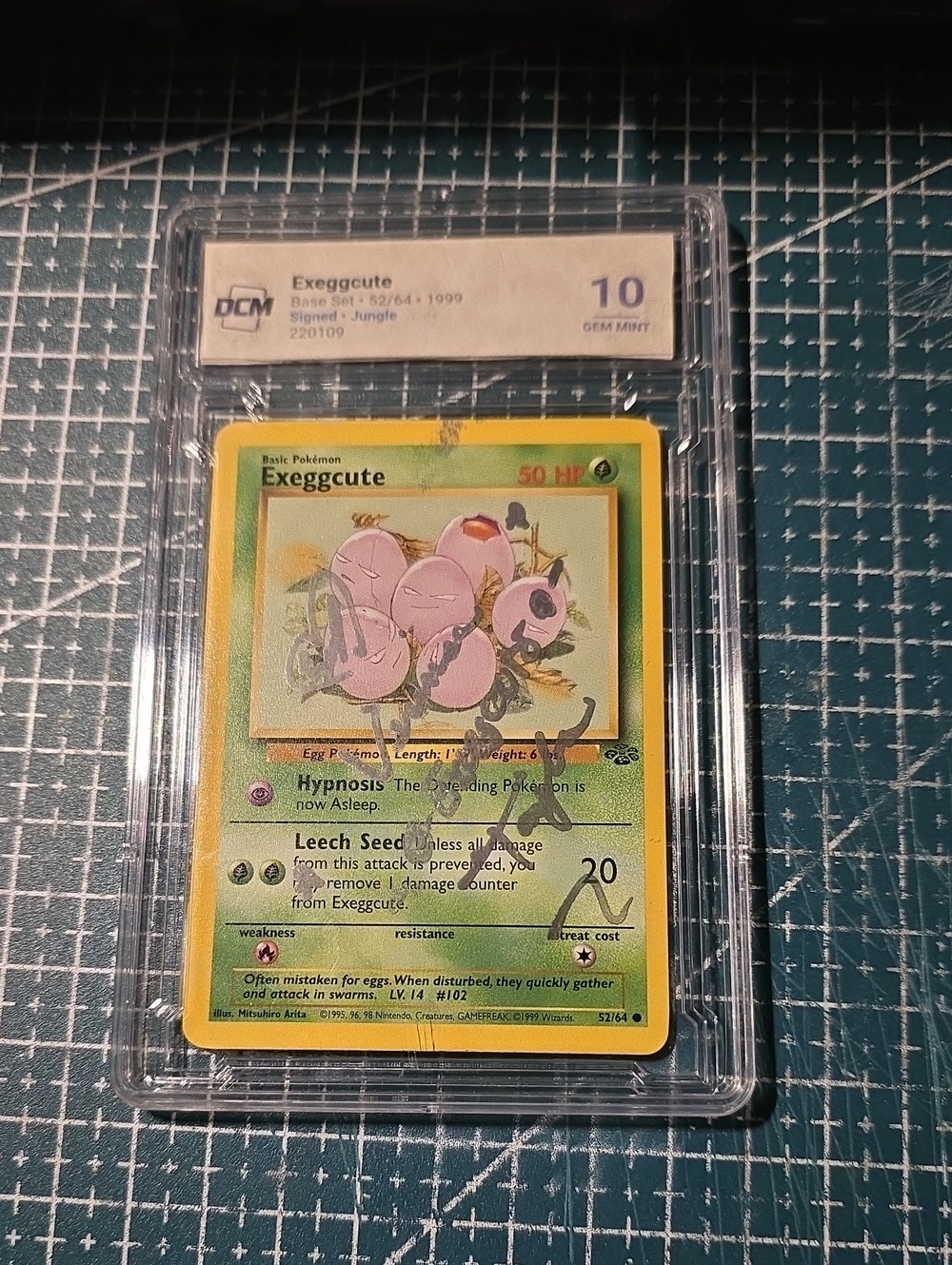 Exeggcute Pokémon Card Auto (Veronica Taylor) - Yellow & Green
